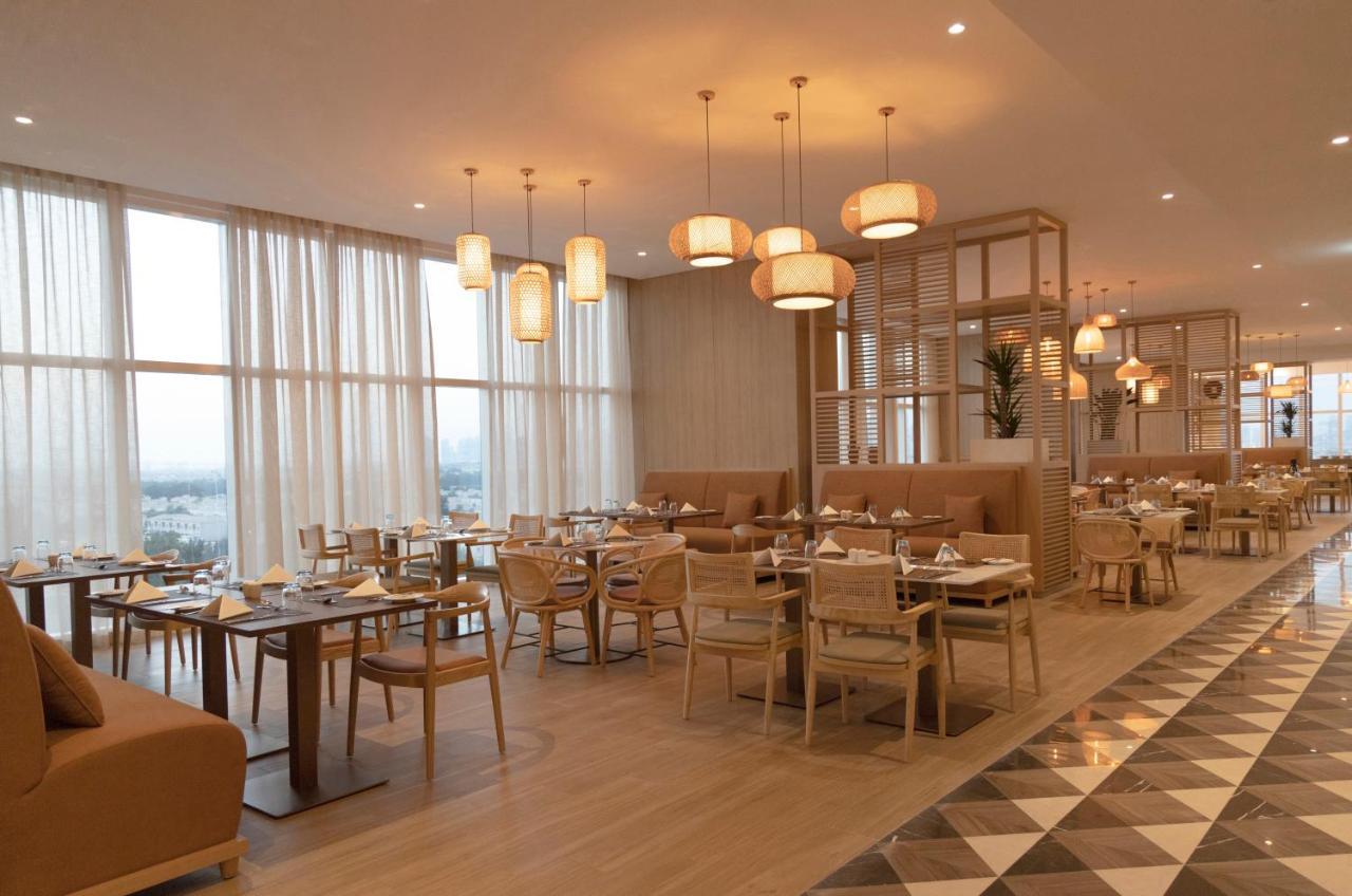Novotel Jumeirah Village Triangle Dubai Exterior photo