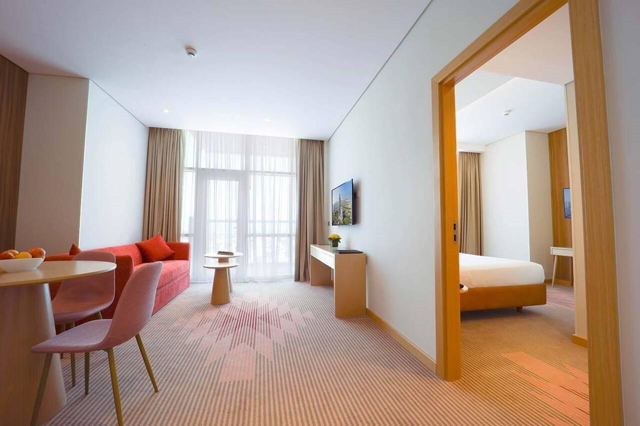 Novotel Jumeirah Village Triangle Dubai Exterior photo